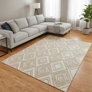 Photo of Peach And Ivory Geometric Washable Area Rug With UV Protection