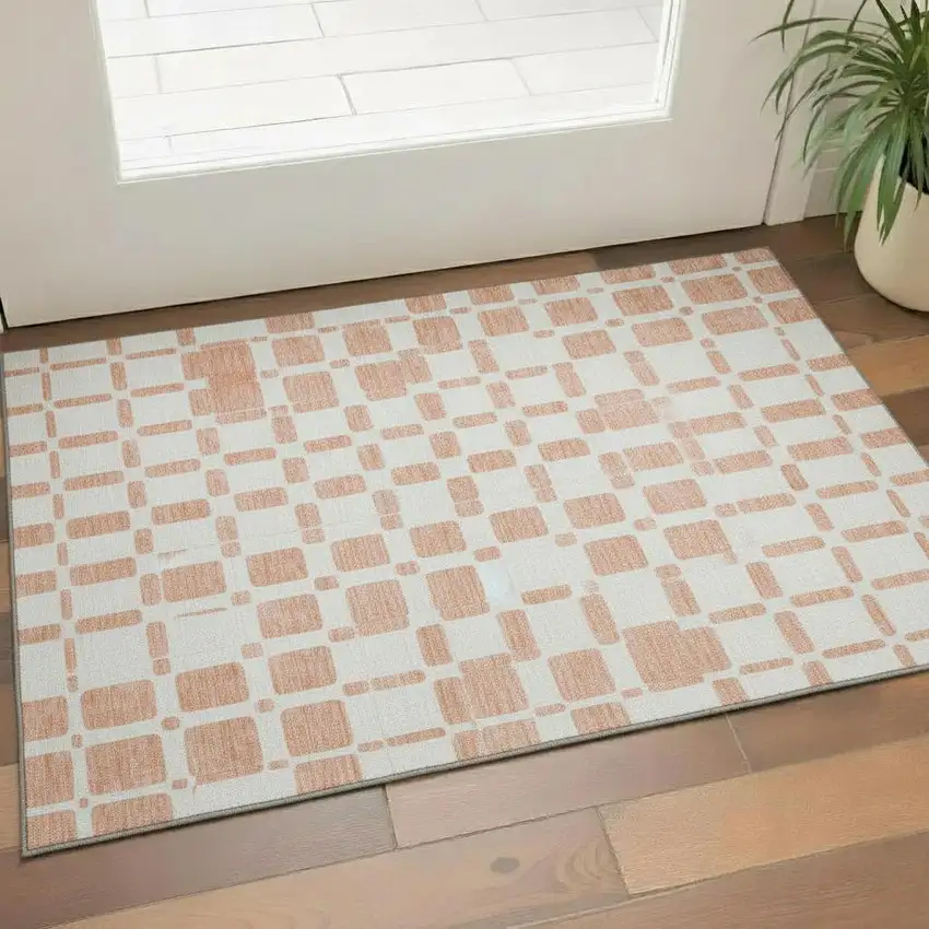 Peach And Ivory Geometric Washable Area Rug With UV Protection Photo 1