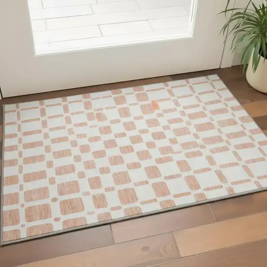 Peach And Ivory Geometric Washable Area Rug With UV Protection Photo 2
