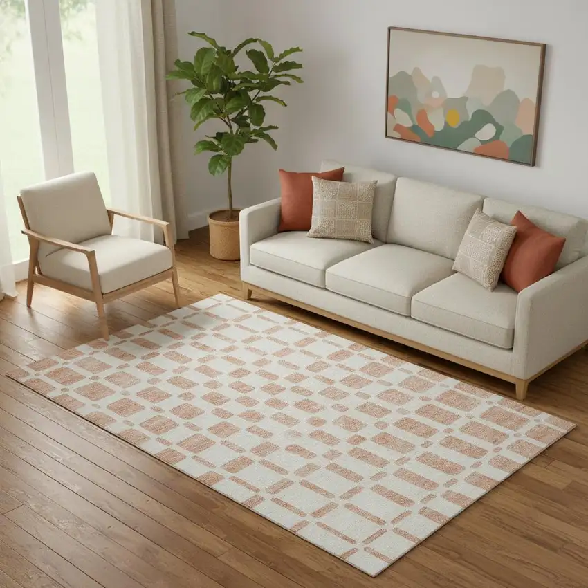 Peach And Ivory Geometric Washable Area Rug With UV Protection Photo 1
