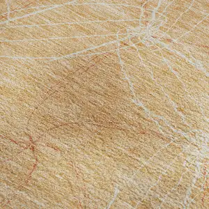 Photo of Peach And Ivory Geometric Washable Area Rug With UV Protection