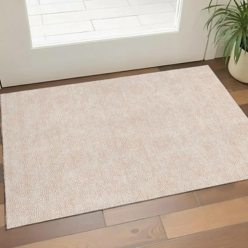 Peach And Ivory Geometric Washable Area Rug With UV Protection Photo 1
