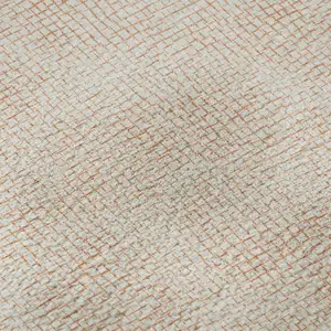 Photo of Peach And Ivory Geometric Washable Area Rug With UV Protection
