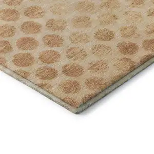 Photo of Peach And Ivory Geometric Washable Area Rug With UV Protection