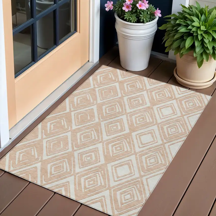 Peach And Ivory Geometric Washable Indoor Outdoor Area Rug Photo 1