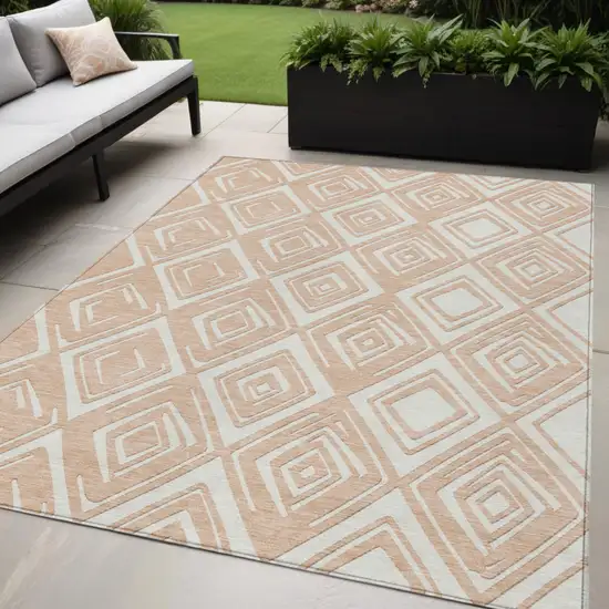 Peach And Ivory Geometric Washable Indoor Outdoor Area Rug Photo 1