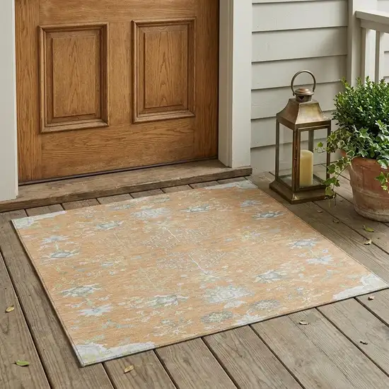 Peach And Ivory Oriental Washable Indoor Outdoor Area Rug Photo 1