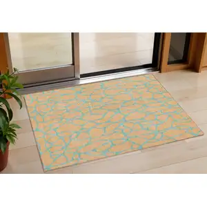 Photo of Peach And Mint Green Geometric Washable Indoor Outdoor Area Rug