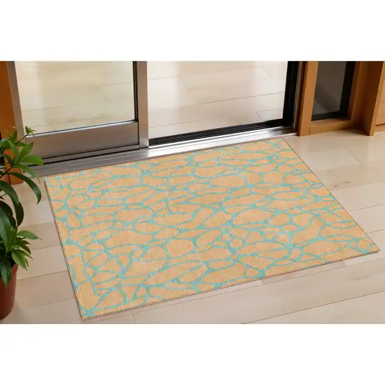 Peach And Mint Green Geometric Washable Indoor Outdoor Area Rug Photo 1
