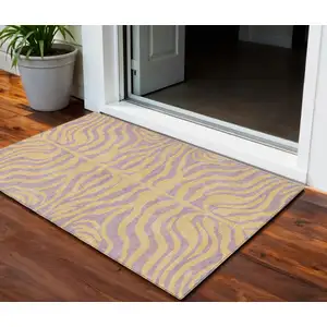 Photo of Peach And Purple Animal Print Washable Indoor Outdoor Area Rug