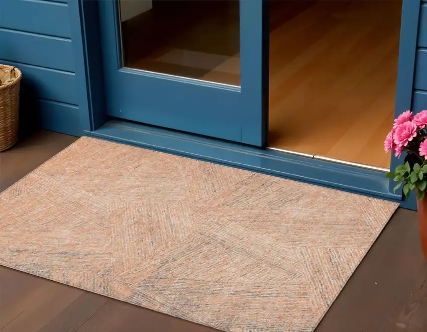 Peach Blue And Ivory Abstract Washable Indoor Outdoor Area Rug Photo 1