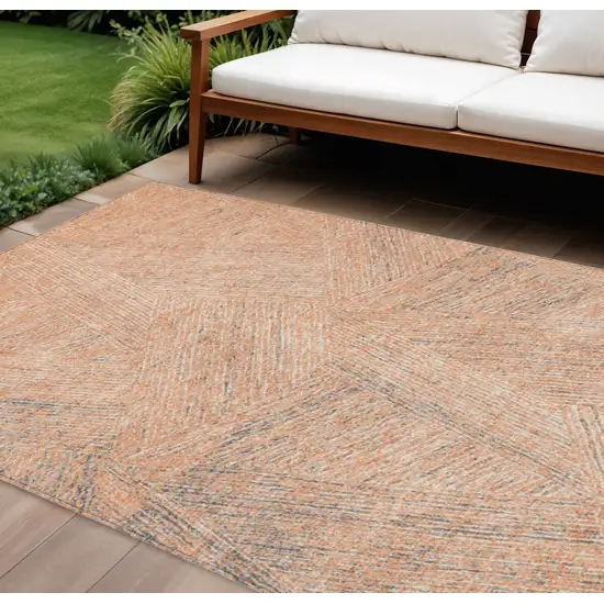 Peach Blue And Ivory Abstract Washable Indoor Outdoor Area Rug Photo 1