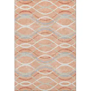 Photo of Peach Gray And Ivory Abstract Washable Area Rug With UV Protection