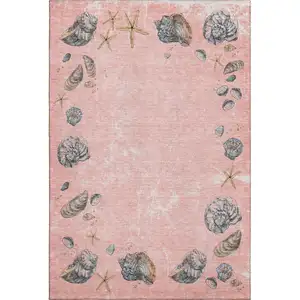 Photo of Peach Gray And Ivory Geometric Washable Area Rug With UV Protection