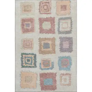 Photo of Peach Ivory And Blue Geometric Washable Area Rug With UV Protection