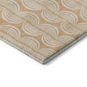 Photo of Peach Ivory And Brown Ogee Washable Area Rug With UV Protection