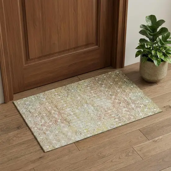 Peach Ivory And Gold Geometric Washable Area Rug With UV Protection Photo 1