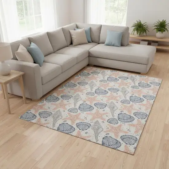 Peach Ivory And Navy Blue Geometric Washable Area Rug With UV Protection Photo 1