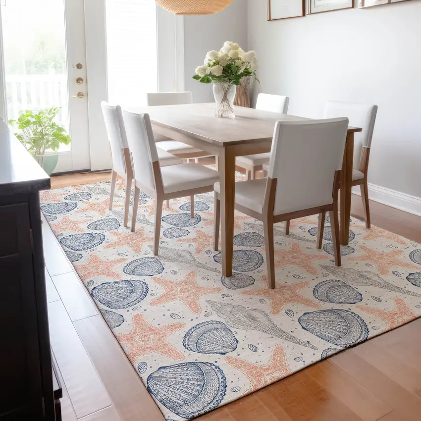 Peach Ivory And Navy Blue Geometric Washable Area Rug With UV Protection Photo 6