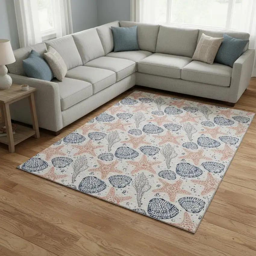 Peach Ivory And Navy Blue Geometric Washable Area Rug With UV Protection Photo 1