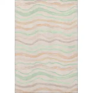 Photo of Peach Mint Green And Linen Striped Washable Area Rug With UV Protection