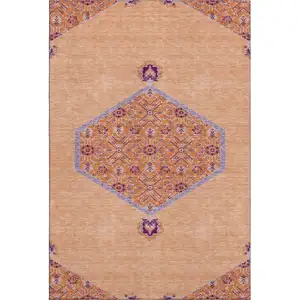 Photo of Peach Orange And Beige Oriental Washable Area Rug With UV Protection