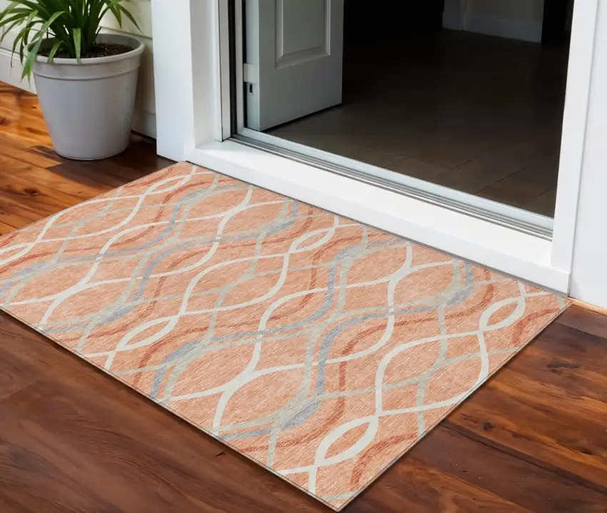 Peach Orange And Gray Abstract Washable Indoor Outdoor Area Rug Photo 1