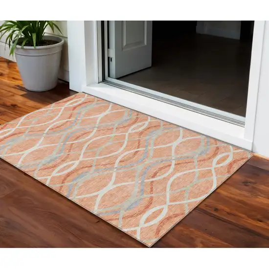 Peach Orange And Gray Abstract Washable Indoor Outdoor Area Rug Photo 1