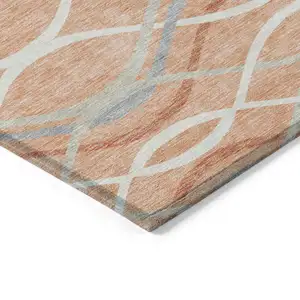 Photo of Peach Orange And Gray Abstract Washable Indoor Outdoor Area Rug