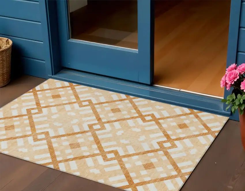 Peach Orange And Ivory Geometric Washable Indoor Outdoor Area Rug Photo 1