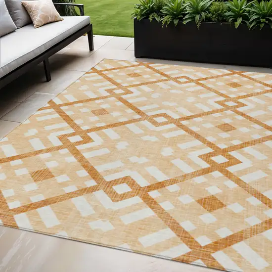 Peach Orange And Ivory Geometric Washable Indoor Outdoor Area Rug Photo 1