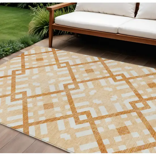 Peach Orange And Ivory Geometric Washable Indoor Outdoor Area Rug Photo 1