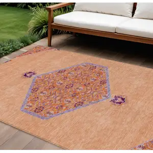 Photo of Peach Purple And Burgundy Oriental Washable Indoor Outdoor Area Rug