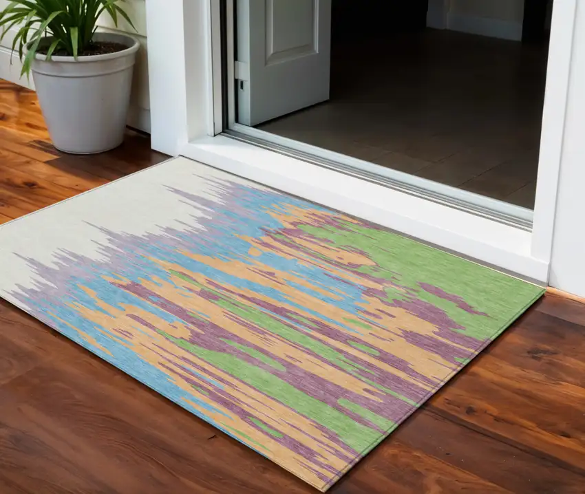 Peach Purple And Green Abstract Washable Indoor Outdoor Area Rug Photo 1