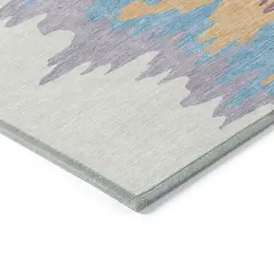 Photo of Peach Purple And Green Abstract Washable Indoor Outdoor Area Rug