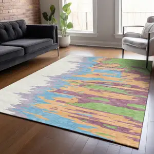 Photo of Peach Purple And Green Abstract Washable Indoor Outdoor Area Rug