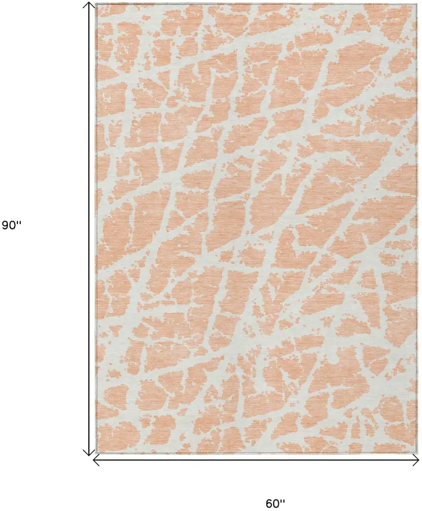 Peach and Ivory Abstract Washable Non Skid Indoor Outdoor Area Rug Photo 3