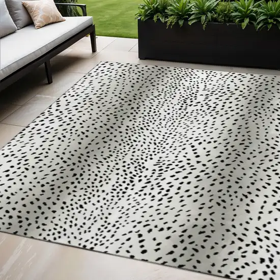 Pearl And Black Animal Print Washable Indoor Outdoor Area Rug Photo 1