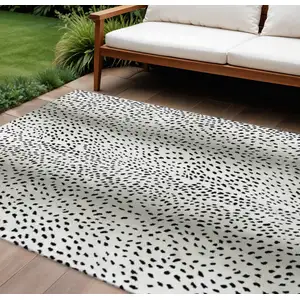 Photo of Pearl And Black Animal Print Washable Indoor Outdoor Area Rug