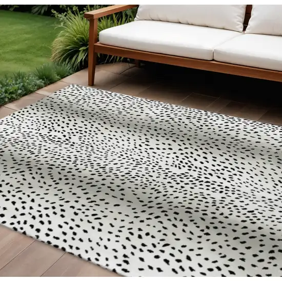 Pearl And Black Animal Print Washable Indoor Outdoor Area Rug Photo 1