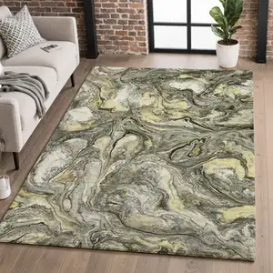 Photo of Pewter And Gold Abstract Washable Area Rug With UV Protection