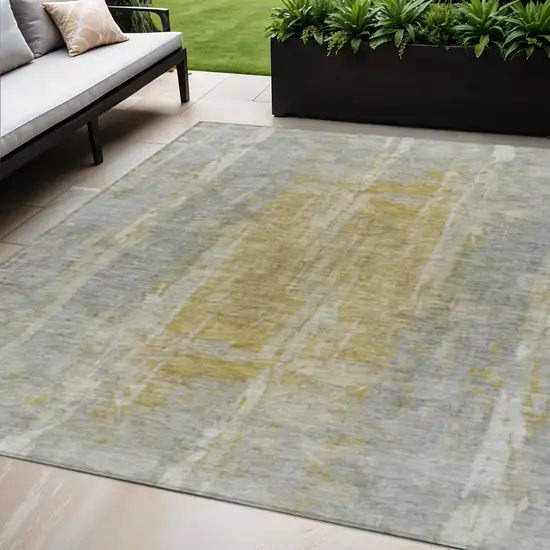 Pewter And Gold Abstract Washable Indoor Outdoor Area Rug Photo 1