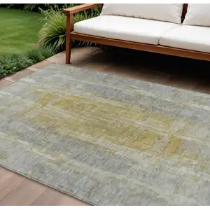 Photo of Pewter And Gold Abstract Washable Indoor Outdoor Area Rug