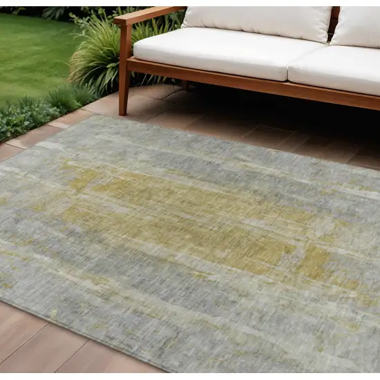 Pewter And Gold Abstract Washable Indoor Outdoor Area Rug Photo 1