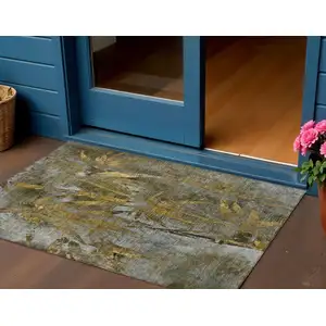 Photo of Pewter And Gold Botanical Leaves Washable Indoor Outdoor Area Rug