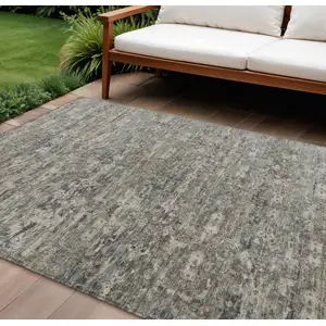 Photo of Pewter And Silver Ikat Washable Indoor Outdoor Area Rug