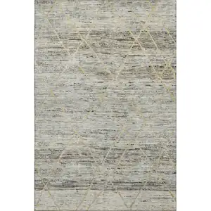 Photo of Pewter Beige And Gold Abstract Geometric Washable Area Rug With UV Protection