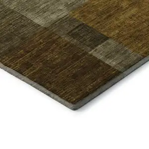 Photo of Pewter Gold And Brown Geometric Washable Area Rug With UV Protection