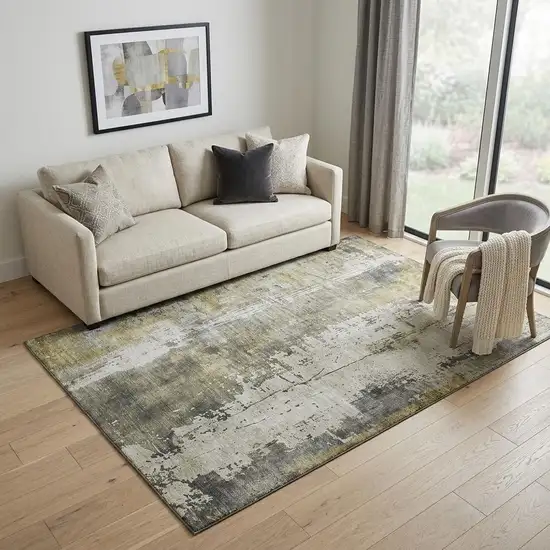 Pewter Gold And Ivory Abstract Washable Area Rug With UV Protection Photo 1