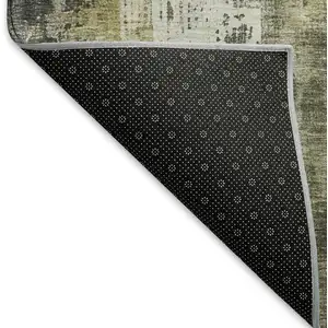 Photo of Pewter Gold And Ivory Abstract Washable Area Rug With UV Protection
